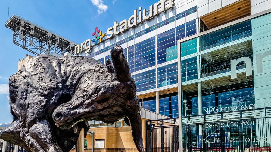 Sculpture of a charging bull in front of NRG Stadium, a landmark venue in Houston, Texas.